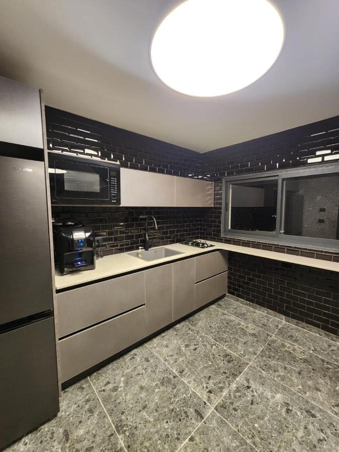 מבנים בים 75 Suites At Sea Haïfa Extérieur photo