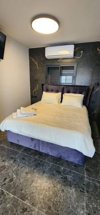 מבנים בים 75 Suites At Sea Haïfa Extérieur photo